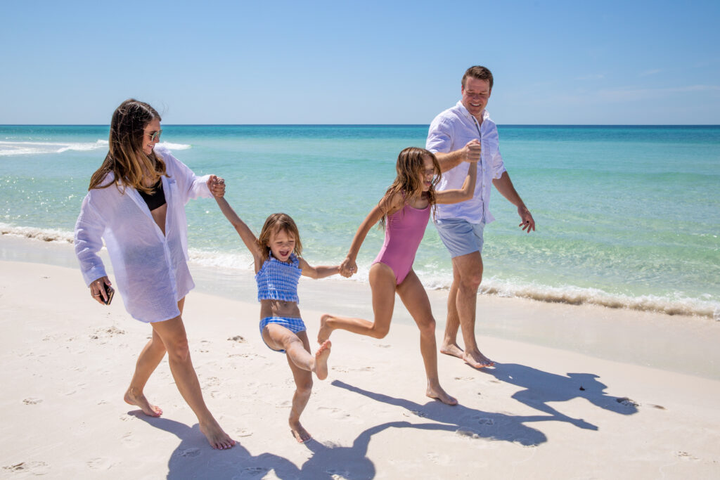 A family walking on the beach