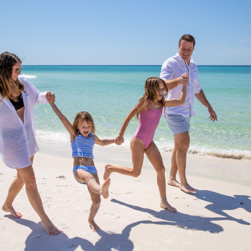 A family walking on the beach