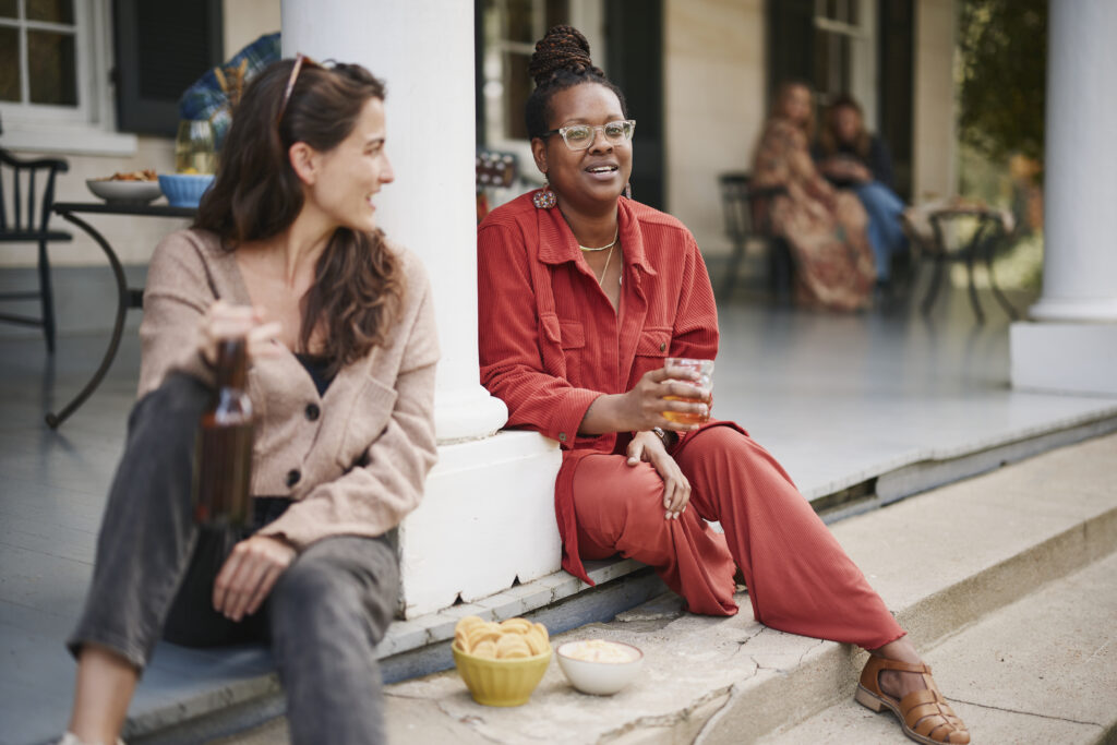 drinking and socializing on a southern front porch.